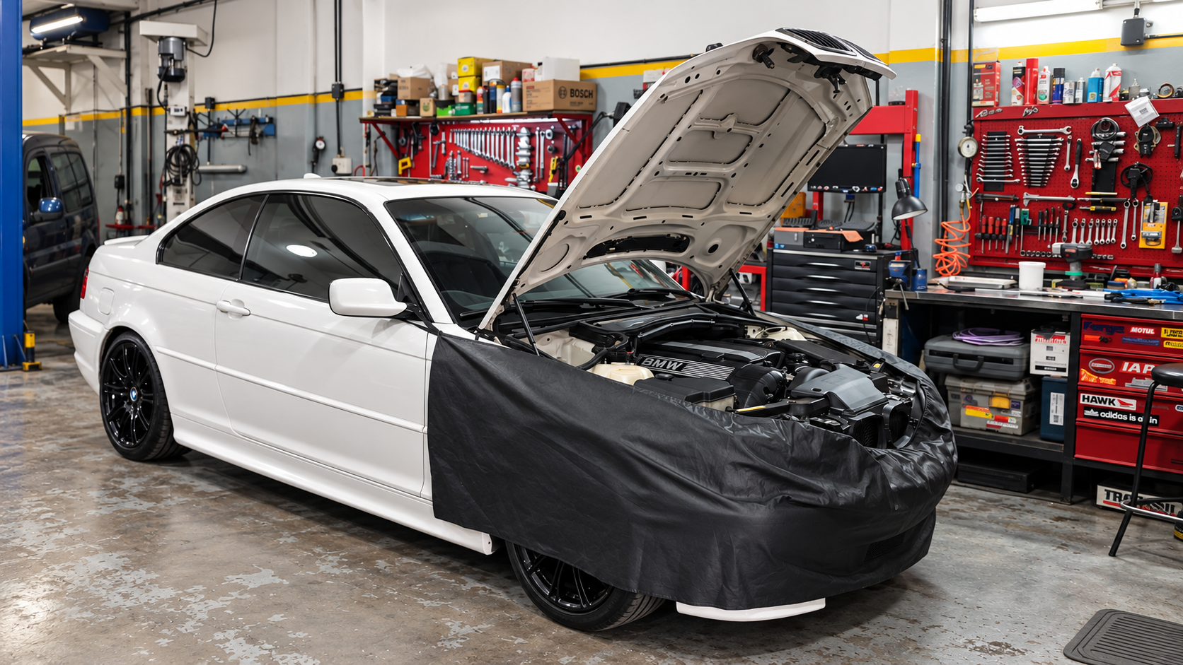 BMW en servicio dentro del taller Pellizzari Sport